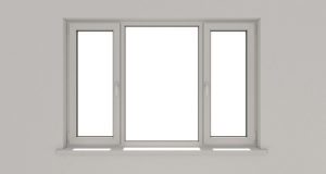 Three paned window installed on white wall