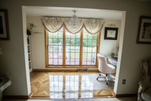 windows installed in living room of suburban home
