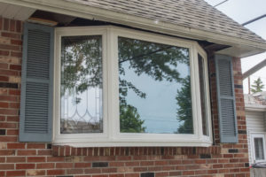 bay window installed on front of suburban home